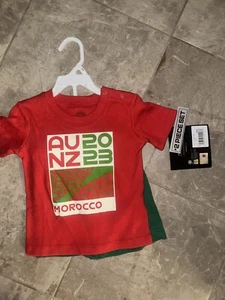 Outerstuff Unisex Niño Copa Mundial FIFA 23 Camiseta Corta Conjunto Marruecos Fútbol 18 Meses - Imagen 1 de 9