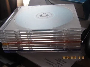 9 Empty clear CD cases for sale. - Afbeelding 1 van 1