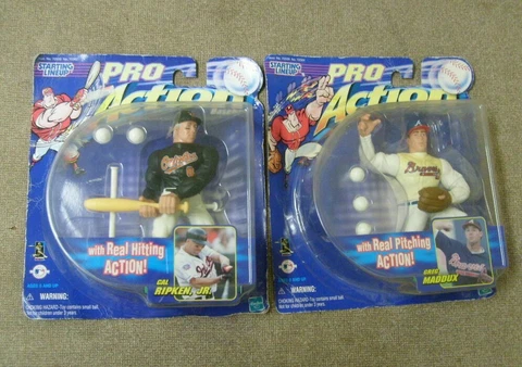 Major League Baseball PRO ACTION Hasbro figures Cal Ripkin Jr and Greg Maddux Cover
