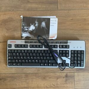 Compaq Silver and Black PS/2 Keyboard Model SDM4700P