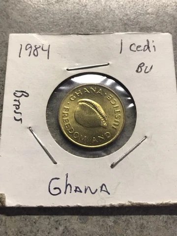 GHANA 1 CEDIS 1984 UNC  COWRIE SHELL,RAMPANT LION AT CENTER OF QUARTERED SHIELD Cover