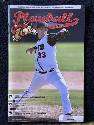 OFFICIAL MAGAZINE OF MODESTO NUTS BASEBALL PLAYBALL #4 CRAIG BAKER COVER 07/2009 - Image 1 of 4