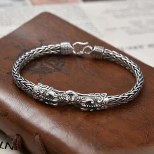 Brazalete de trigo trenzado con cabeza de dragón doble de la suerte de plata esterlina pura S925 30 g - Imagen 1 de 5