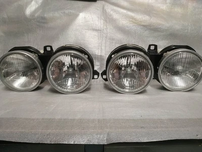 Faros BMW E30-M3 L+R Euro Hella prefacelift NUEVO OEM 63121372661 63121372662 Foto 1 de 4