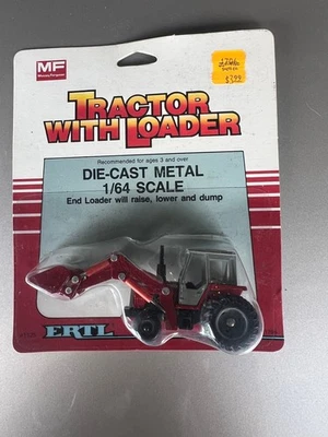 Tractor Massey Ferguson MF 699 1/64 con cargador.  Nuevo en tarjeta Foto 1 de 4