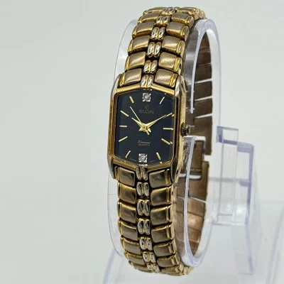 Reloj pulsera clásico ELGIN tono dorado con detalles de diamantes, esfera negra, funciona Foto 1 de 4