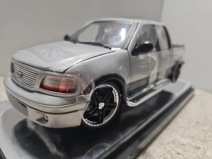 Ertl Am. Muscle 2003 Ford F-150 Blades Limited Ed.Toys R Us Excl. 1/ 1600 1:18  - Picture 1 of 24