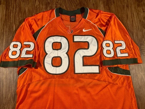 Miami Hurricanes Greg Olsen (Panthers) sewn Nike jersey - size XL 48 Length +2 Cover