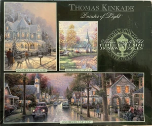 Thomas Kinkade Deluxe 3 Puzzle Set #3632-7. Zwei FABRIKVERSIEGELTE. SEHR GUT! - Bild 1 von 4