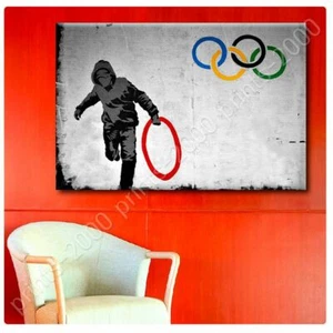 Olympische Ringe London von Banksy | Poster oder Wandsticker Aufkleber | Wandbild HD - Bild 1 von 18