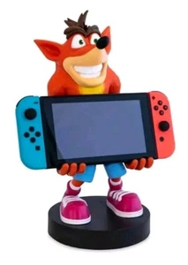 SOPORTE DISPOSITIVO CABLE BOYS XL CRASH BANDICOOT 12" XL FIGURA NINTENDO SWITCH 2. - Imagen 1 de 6