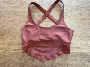 Sujetador deportivo Free People marrón óxido pequeño brillo halter espalda cruzada nuevo sin etiquetas - Imagen 1 de 2
