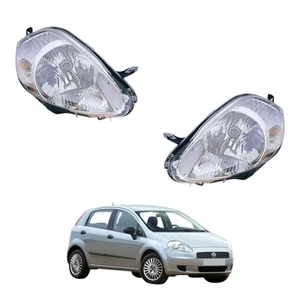 Paar Frontscheinwerfer Fiat Grande Punto DX-SX - mit Motor Parabel Chrom. (7 PIN) - Bild 1 von 5