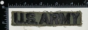 Früher Vietnamkrieg US Armee schwarz auf OD Uniform Anhänger Band TWILL Patch Hergestellt in den USA gebraucht - Bild 1 von 2