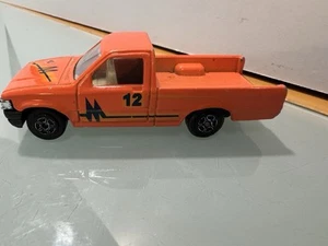 Camioneta pickup Toyota diecast escala 1:43 NARANJA modelo juguete sin marca - Imagen 1 de 7