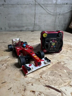 Bburago 18-41215 - Race & Play Wrist Racers F2012 1:32 radiocomandata - Immagine 1 di 4