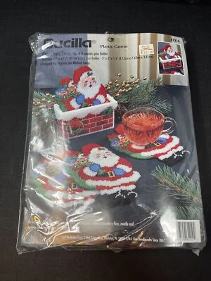 BUCILLA Plastic Canvas Here Comes Santa Coaster And Holder Set NIP 1996 - Image 1 of 4