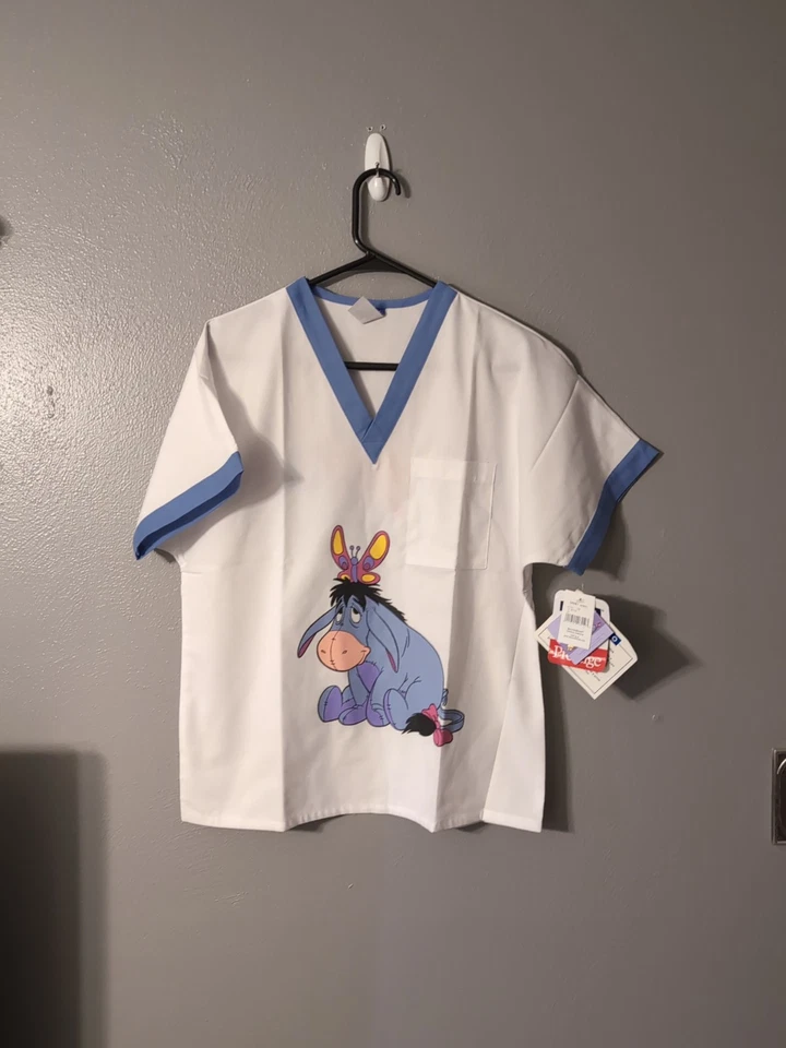 Disney Eeyore Scrub Top White Blue Trim V Neck Size XS Graphic NWT - Image 1 of 4