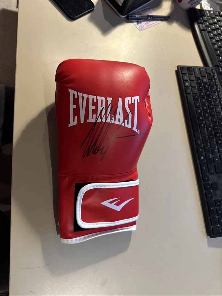 Mike Tyson Signed Boxing Glove with a Certificate of Authenticity (COA) - Image 1 of 1