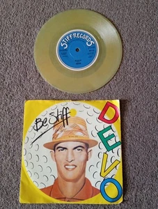 DEVO -  BE STIFF  7'' TRANSPARENT  YELLOW MILKY VINYL SINGLE IN PICTURE SLEEVE  - Picture 1 of 4