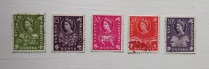 Kenya, Uganda & Tanganyika used part stamp set: 1960 Flowers, Animals & Motifs - Picture 1 of 1