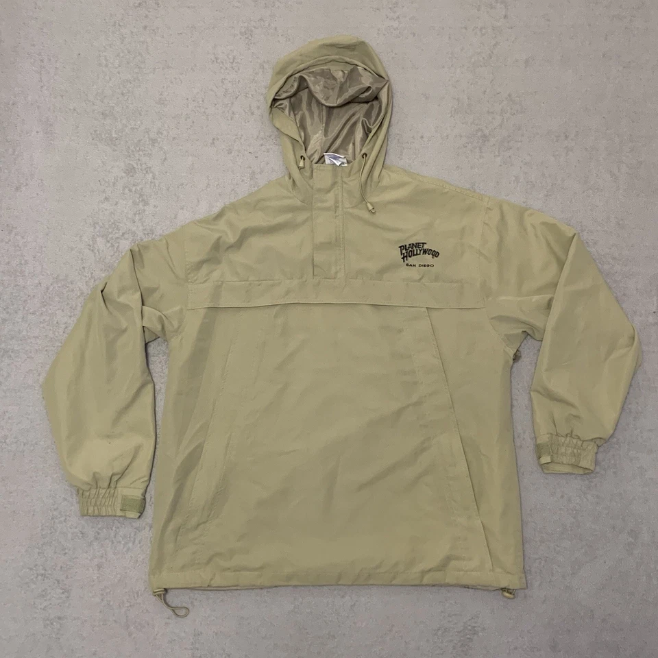 Jaqueta corta-vento masculina vintage Planet Hollywood 2XL capuz 1/4 zíper bege defeito 1998 - Imagem 1 de 4