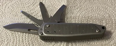 Новый Leatherman бесплатный T2 карманный нож мульти инструмент идеальное состояние отличный подарок - Изображение 1 из 4