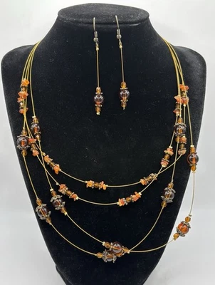 Collares y pendientes colgantes con cuentas flotantes estación de vidrio facetado ámbar en capas Foto 1 de 4