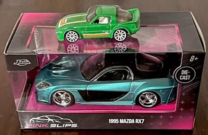 2024 JADA BRAGAS ROSA 1/32. Mazda RX 1995-7 como nuevo verde + bonificación Hot Wheels RX-7 - Imagen 1 de 5