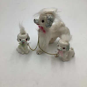 FIGURA DE CANICHE Y CACHORROS CUBIERTOS DE PIEL DE COLECCIÓN - Imagen 1 de 5