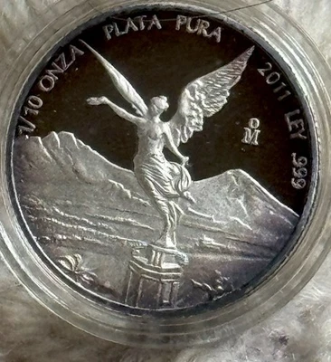 2011 1/10oz .999 Silver Proof Libertad Coin In Sealed Capsule Very Small Toning - Image 1 of 3