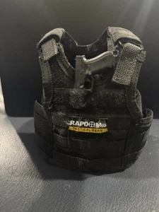 Chaleco negro táctico militar militar ejército cerveza botella refresco soporte para bebidas y mini Glock - Imagen 1 de 6