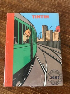 Agenda Diary TINTIN 2005 Neuf sous emballage Ed. Moulinsart - Foto 1 di 2
