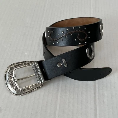 CINTURÓN WESTERN MUJER ARIAT CUERO NEGRO CON HEBILLA PLATEADA Y HERRADURAS 28/70 Foto 1 de 4
