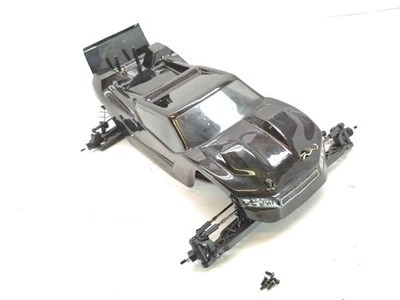 Chasis deslizante de rodillos para camión de estadio XRAY X-RAY XT2 1/10 2x2 con carrocería negra usado Foto 1 de 4