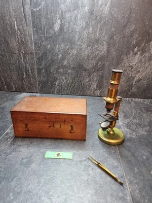 ANTIQUE BOXED FRENCH BRASS STUDENT MICROSCOPE COMPOUND SWIVEL BASE + SLIDE - Image 1 of 4