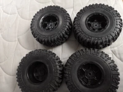 SET GOMME COMPLETE DI CERCHI NERI PER 1/10 MONSTER SCOLPITE (4PZ)- HOBBYTECH - Immagine 1 di 3