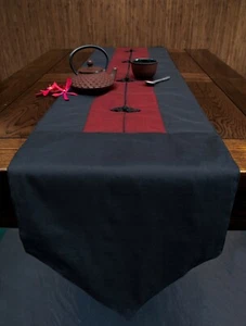 Smart maroon & black 2 metre tapered table runner with decorative toggles. - Picture 1 of 2