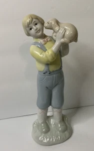 Figurina Prestige Collector's Club Excel 1990 - Ragazzo con cucciolo, alta 7" - Foto 1 di 9