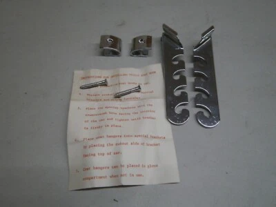 De colección NOS GM Accesorio 1962 1963 1964 Chevrolet Impala Abrigo Gancho Par 985350 Foto 1 de 4