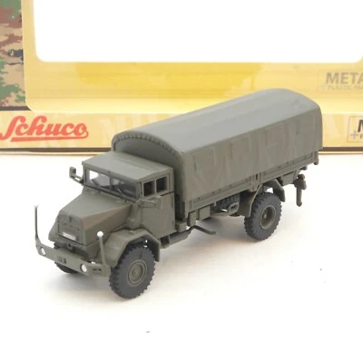 Schuco Military 1:87 45 265 2100 MAN 630 L2AE Pritschen LKW in OVP RG2493 - Bild 1 von 3