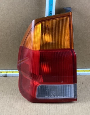 Conjunto de luz trasera izquierda del lado del conductor Mitsubishi Montero Sport 1997-1999 OEM Foto 1 de 4