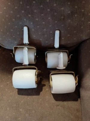 Antique mcm plastic locking wheels - Image 1 of 3