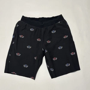 Pantalones Cortos Deportivos Champion Tejido Inverso Para Hombre Medianos Negros Estampado Completo Corte 10" - Imagen 1 de 7