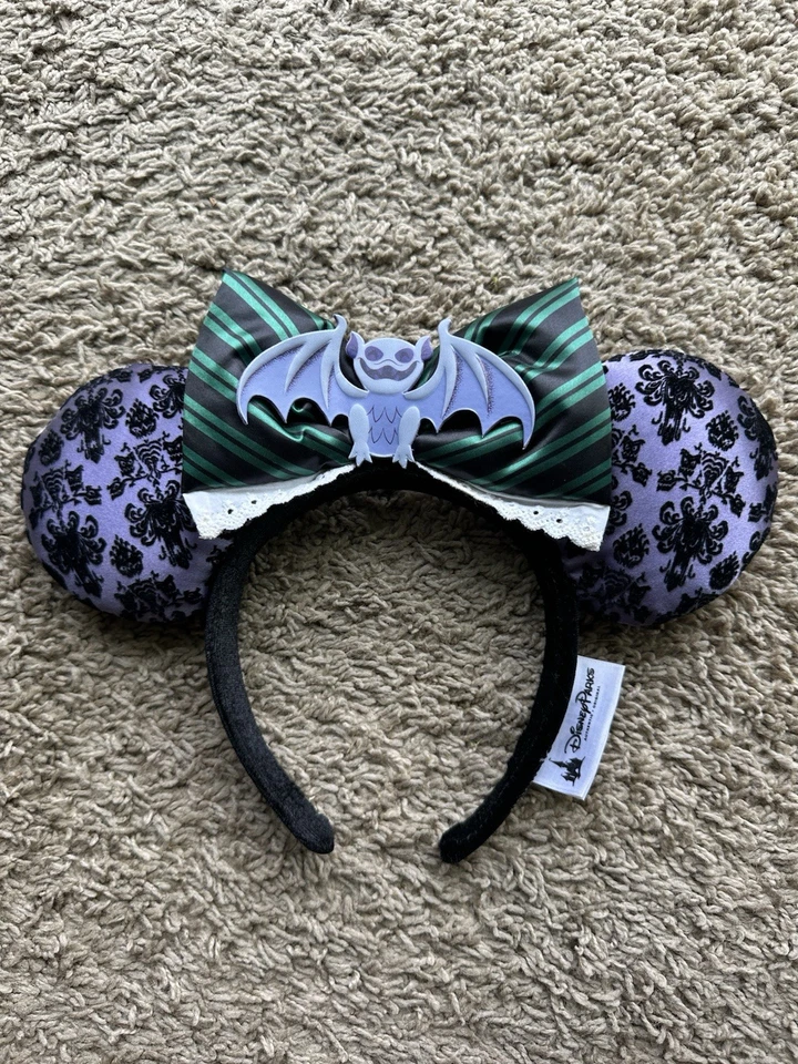 Papel pintado murciélago anfitriona mansión embrujada parque Disney orejas de Minnie diadema Halloween Foto 1 de 2