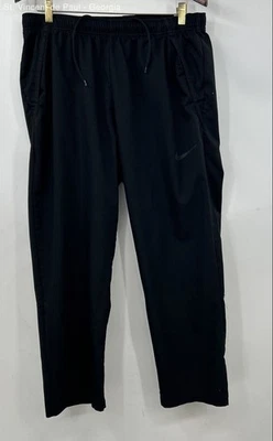Pantalones deportivos Nike negros Dri-fit con cordón para hombre L Y2K cónicos Foto 1 de 4