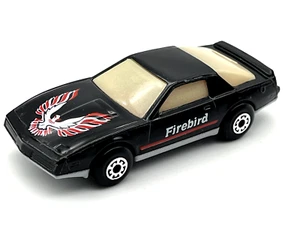 Matchbox MB12 Pontiac Firebird SE Black with RARE Smoked Windows Mint in PVC Box - Picture 1 of 6