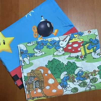 2 винтажных плоских листа: THE SMURFS & NNINTENDO SUPER MARIO KART синие - Изображение 1 из 4