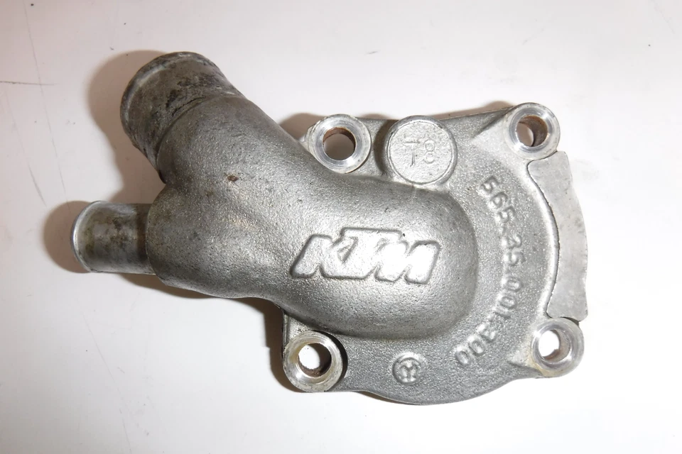 1999 KTM 640 LC4 Dual OEM ENGINE WATER PUMP HOUSING COVER - Image 1 of 2