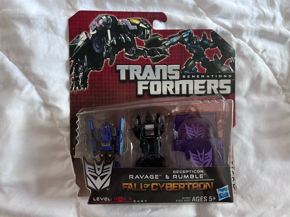 Transformers Generations Fall of Cybertron Ravage and Rumble Hasbro